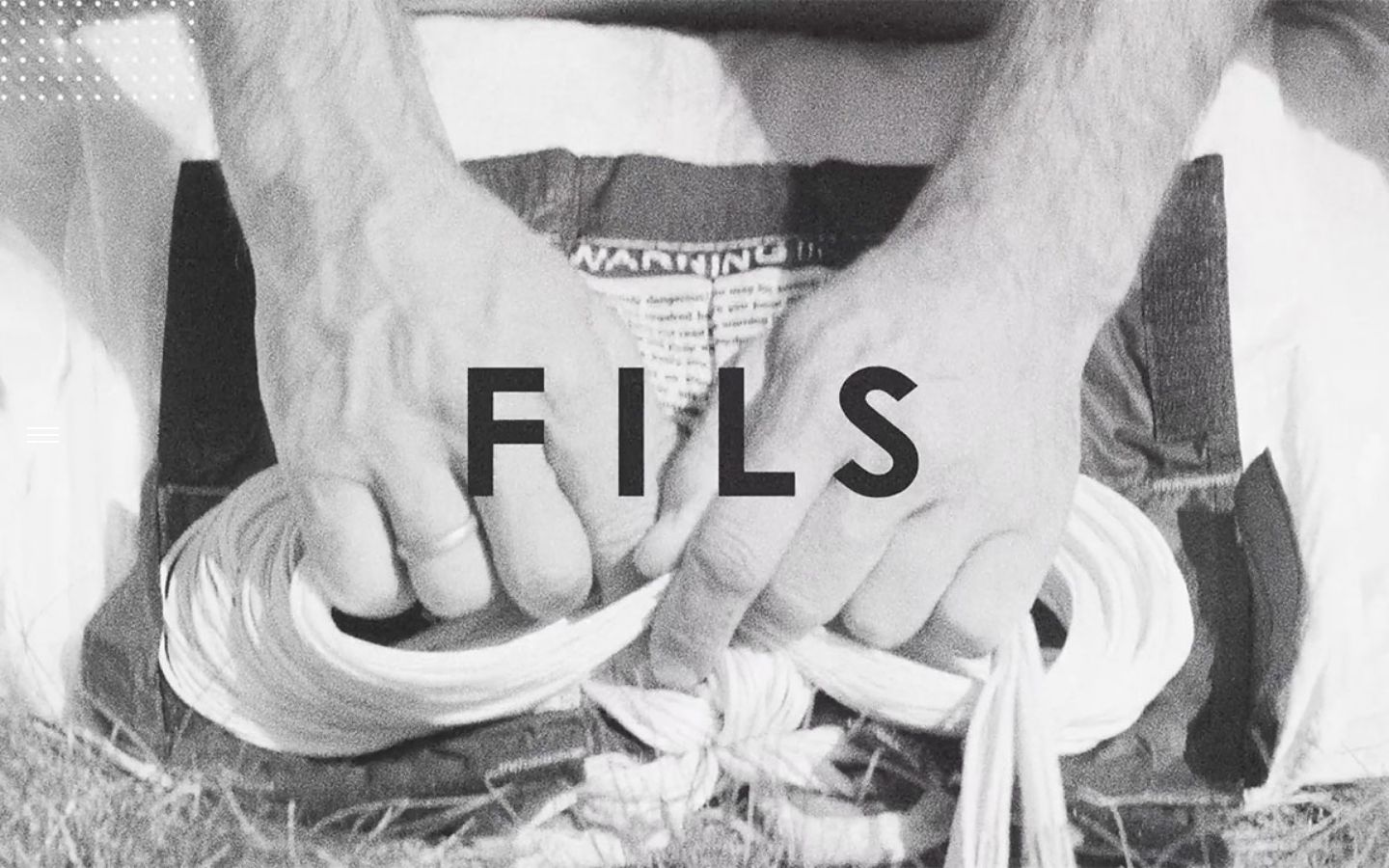 Portada de la web de FILS Legal con la marca sobre una fotografía en blanco y negro